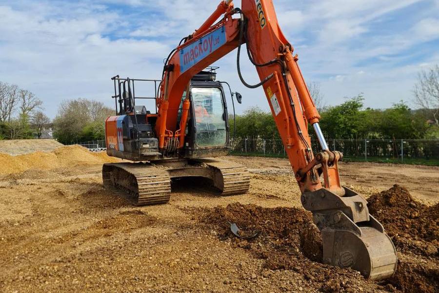 Excavator operator training on a construction site in the South West